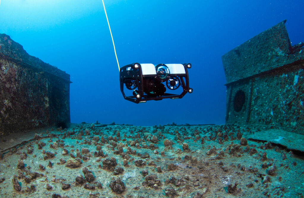 Photo Credit: Jeff Milisen (Blue Robotics) Blue Robotics underwater ROV on a shipwreck