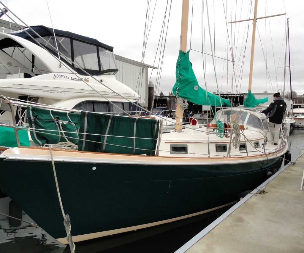 Photo Kindly Provided by: Michael @ Littlecunningplan.com Green Allied Princess 36 sailboat at a marina