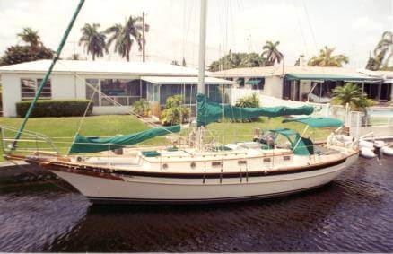 Cabo Rico sailboat with green sails Cabo Rico sailboat with green sails