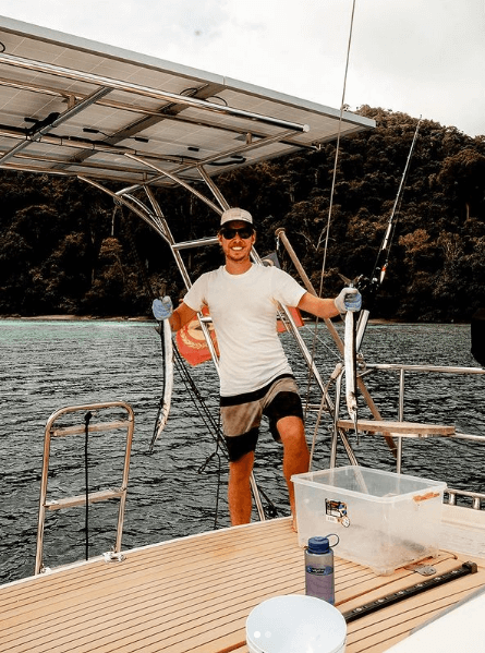 Chris Likins holding needle-fish caught in Thailand Chris Likins holding needle-fish caught in Thailand