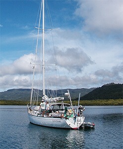 Photo Kindly Provided by: Tom Bailey (Oceannavigator.com) Peterson 44 sailboat with a mountain backdrop