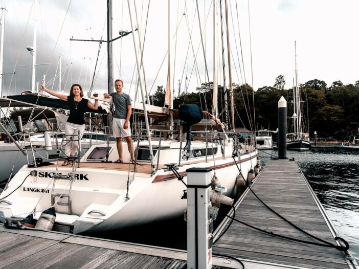 Jennifer Likins and Chris Likins on their sailboat SV Skylark