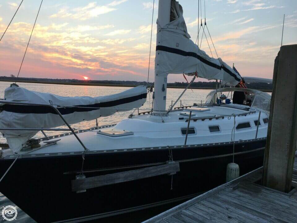 Photo Provided by: Nick Owens (Popyachts.com) Docked Freedom 36 sailboat at sunset