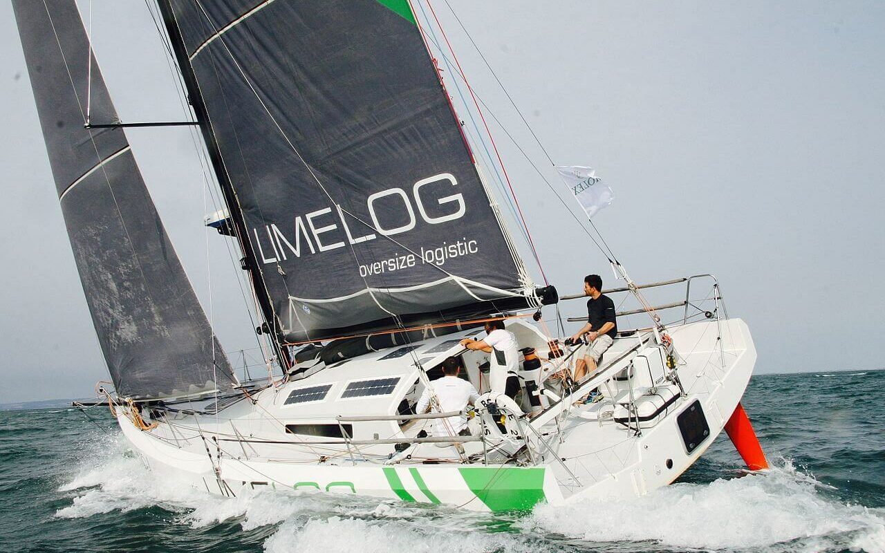 White and green sailboat used for sailing around the world White and green sailboat used for sailing around the world