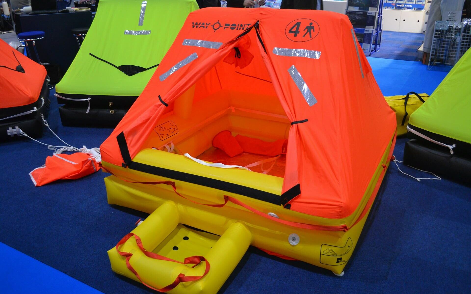 Orange and yellow emergency life raft used for sailing around the world Orange and yellow emergency life raft used for sailing around the world