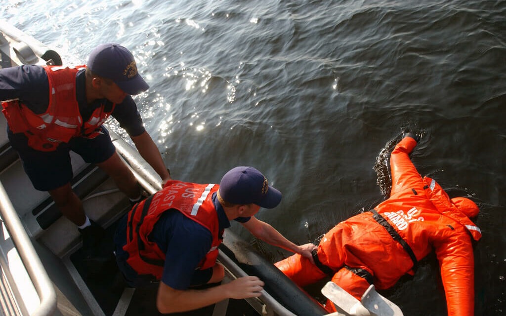 The US Coast Guard practices an emergency rescue drill at sea The US Coast Guard practices an emergency rescue drill at sea
